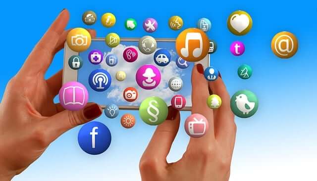 Hands, phone and social media icons